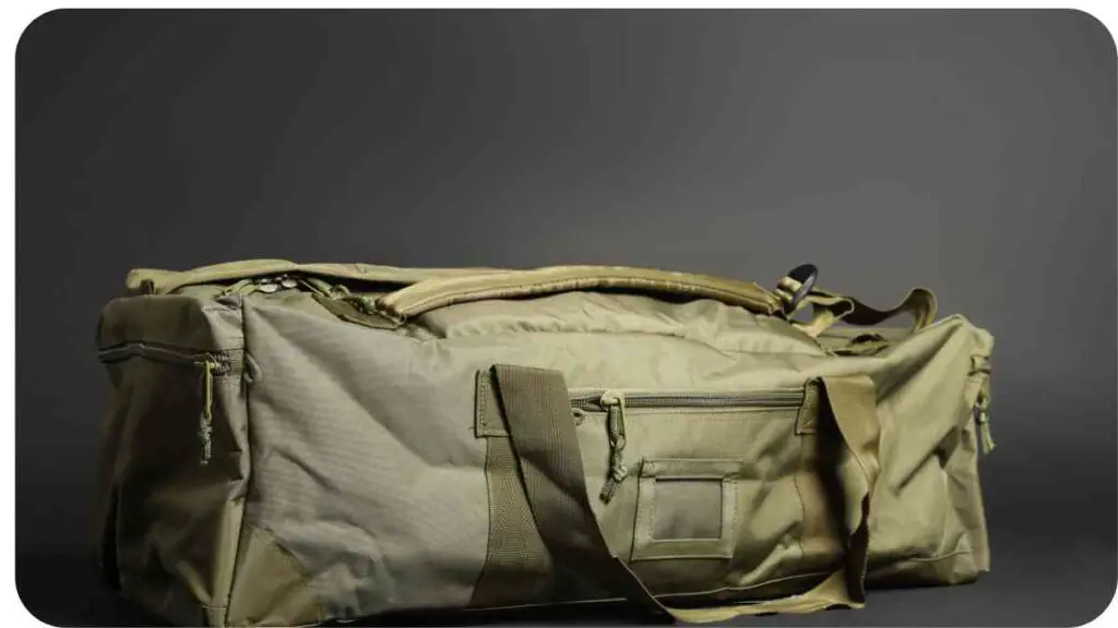 an olive green duffel bag sitting on a table